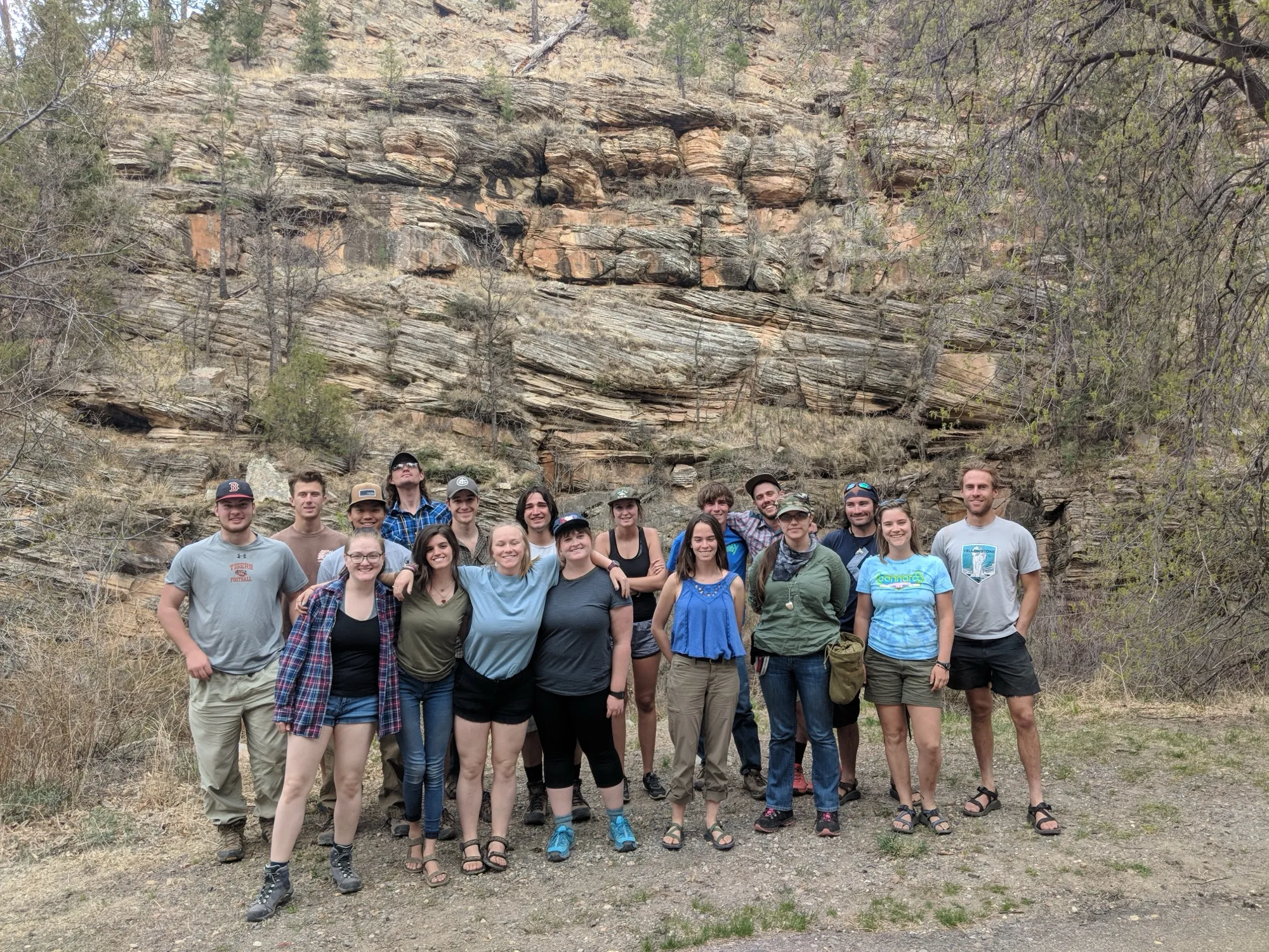 Students reading strata in East Clear Creek canyon