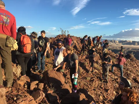Students climbing dunes at Death Valley