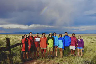 Students lining up to match the colors of the rainbow, after a thunderstorm in the House Rock Valley. Photo by Melissa Mark.